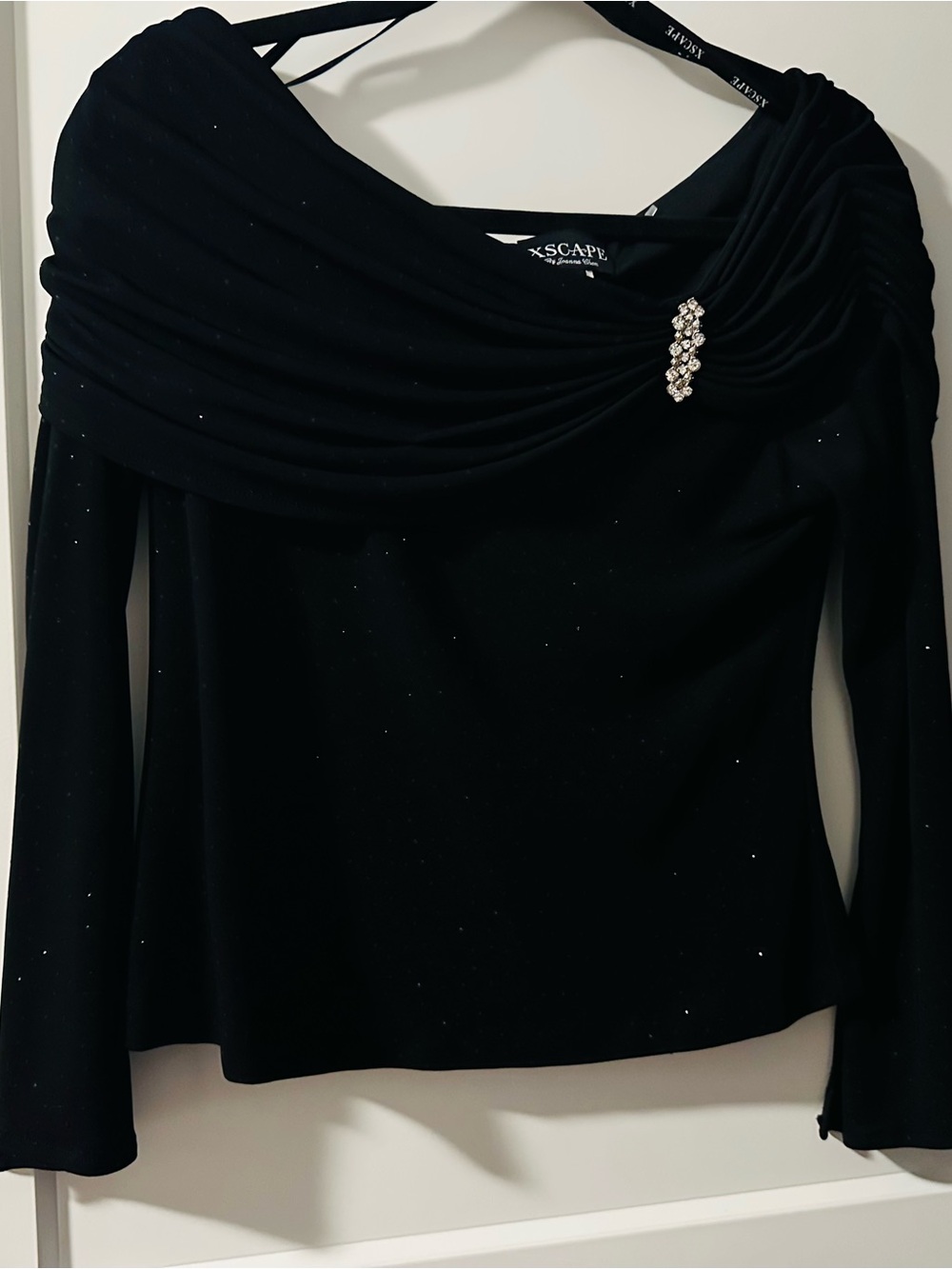 Xscape Black Sparkle Off-Shoulder Drape Top with Rhinestone Brooch